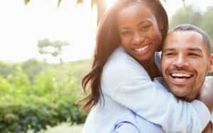 Smiling couple with straight teeth from clear braces near Dayton and South Pittsburg