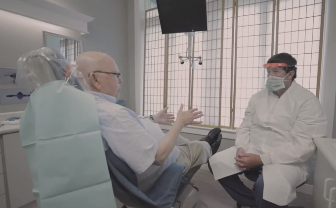 Dr. Carico talks with a patient in his Chattanooga dental practice