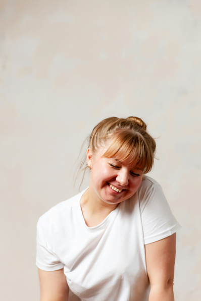 Female dental bonding patient smiles with repaired teeth and new smile in Signal Mountain, TN