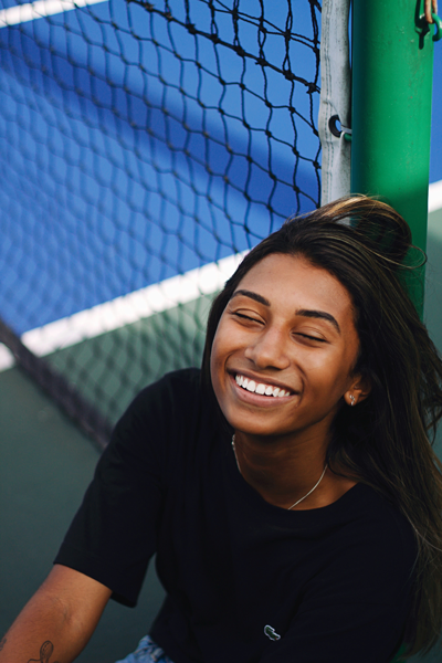 Smiling girl on the tennis court had chipped tooth fixed in Chattanooga, TN